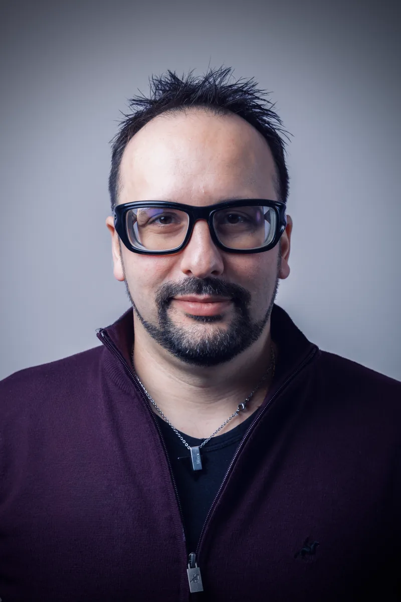 Diego Russo in a front-facing studio headshot
